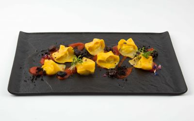 Ravioli al baccalà con salsa al pomodoro e olive